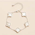 The Colorful Charm Bracelet – Silver/White is a trendy women’s bracelet with bold charms—perfect for layering, everyday outfits, summer looks, and boutique jewelry.