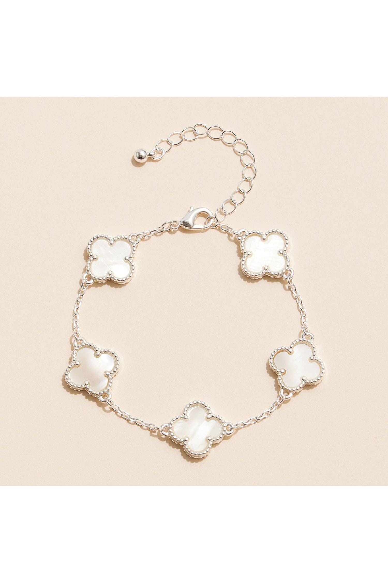 The Colorful Charm Bracelet – Silver/White is a trendy women’s bracelet with bold charms—perfect for layering, everyday outfits, summer looks, and boutique jewelry.